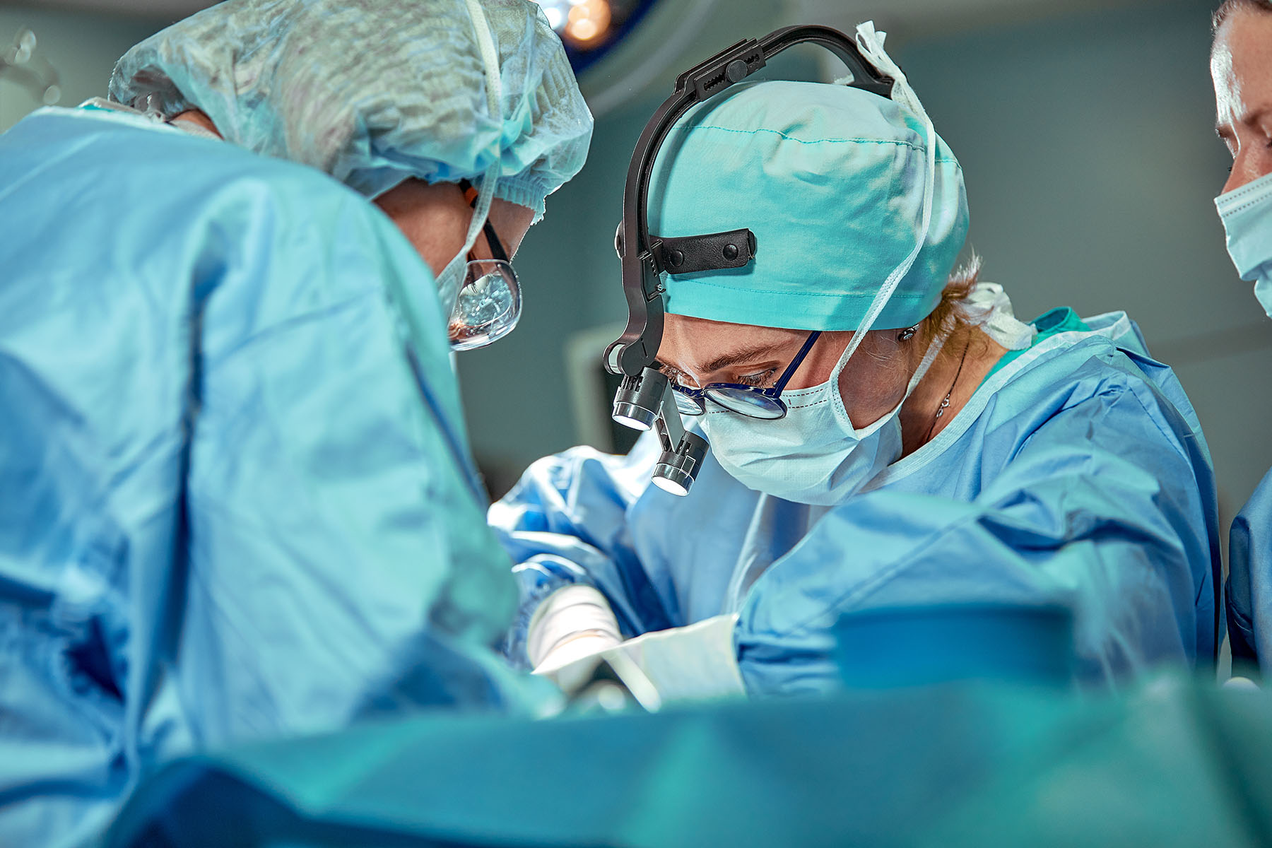 Surgeon preparing for gynecologic surgery